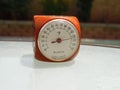 Vintage orange Bakelite Art Deco bakelite French Blavia dice thermometer in the sun